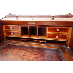  Edwardian inlaid mahogany cylinder front writing desk, with pierced brass galleried top, interior with drawers, compartments and pull out inset leather writing surface above a single drawer, on square tapered supports, with ivorine plaque for 'Charles Jenner & Comp. Edinburgh' W77cm, D53cm, H110cm  