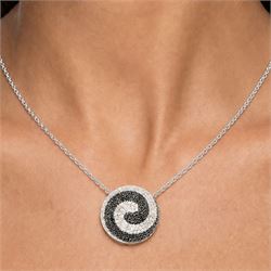 9ct white gold diamond swirl pendant necklace, circular pendant pave set with black and white diamonds, on a fine trace link chain necklace, both hallmarked, total diamond weight approx 1.55 carat