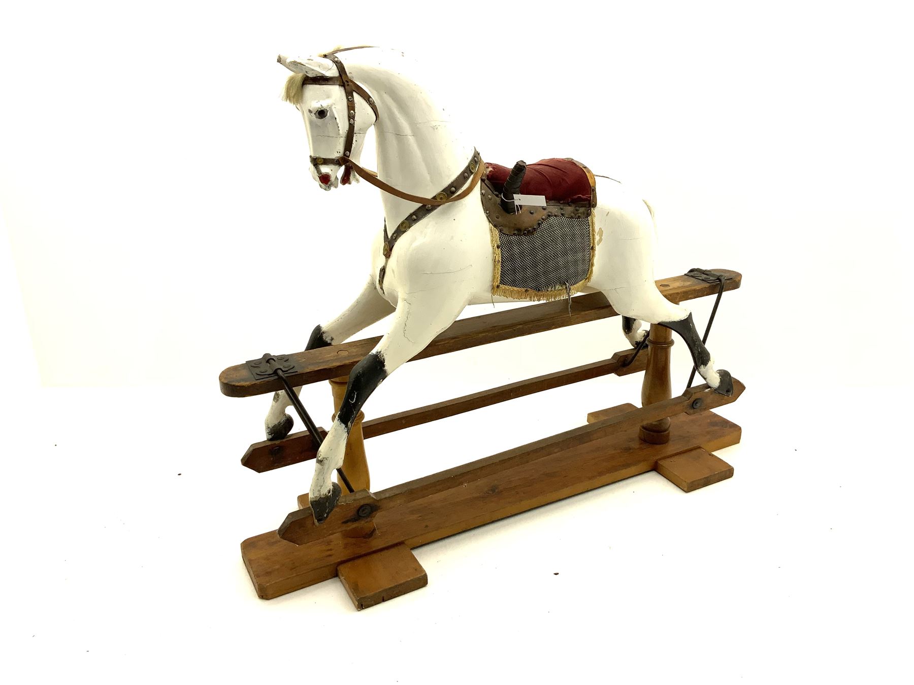 Victorian white finished rocking horse, complete with studded saddle