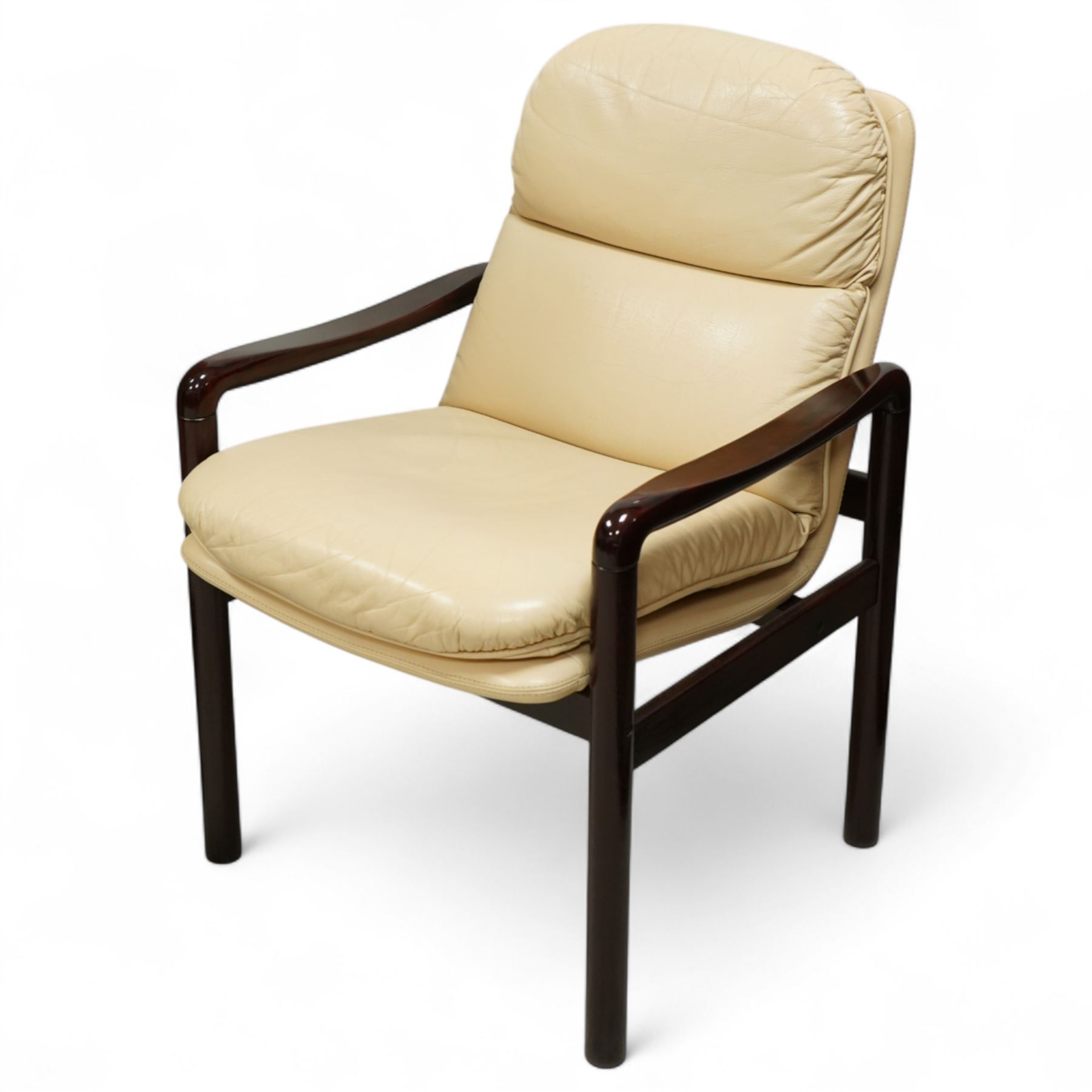 Dyrlund - contemporary pair of armchairs with solid Santos rosewood frame, rounded edges and broad armrests, seat and backrest with a removable cream leather over-stuffed cushions, together with a classic Dyrlund office chair with teak swivel base and cream leather upholstery, 62x44x109cm, (3)


Note: Dyrlund is a Danish furniture manufacturer known for its high-quality, handcrafted pieces, particularly in the mid-century modern style. Founded in 1960 by Frits Hjerte Dyrlund in Rude, Denmark, the company has remained a family business, now run by the second and third generations. Dyrlund specializes in both home and executive office furniture, focusing on practicality, solid construction, and classic design. 
