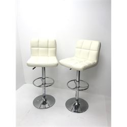 Pair swivel breakfast bar stools upholstered in a white leatherette on chrome base