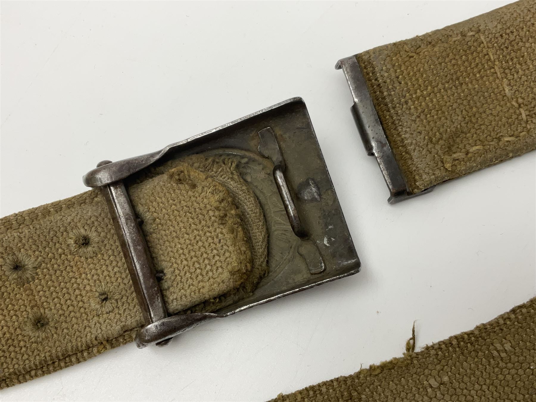 Pair of WW2 German Other Ranks trousers c1940-42, stamped C.& A. Brenninkmeyer Workstatten; WW2 German Army webbing belt with steel 'Gott Mit Uns' buckle; and WW2 German leather belt with 'Stahlhelm' (Steel Helmet League) members buckle (3)