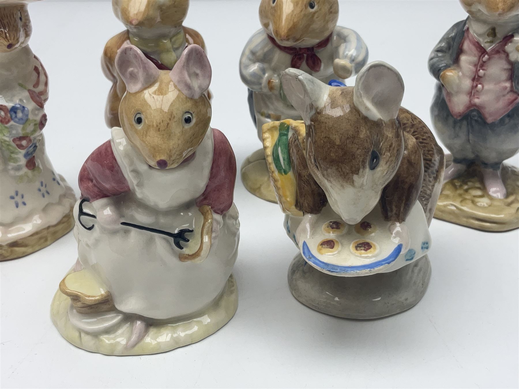 Five Royal Doulton Beatrix Potter figures, comprising Poppy Eyebright, Clover, Lord Woodmouse, Mr Apple and Dusty Dogwood, together with Beswick Appley Dapply figure and three Crummles Beatrix Potter enamel pill boxes