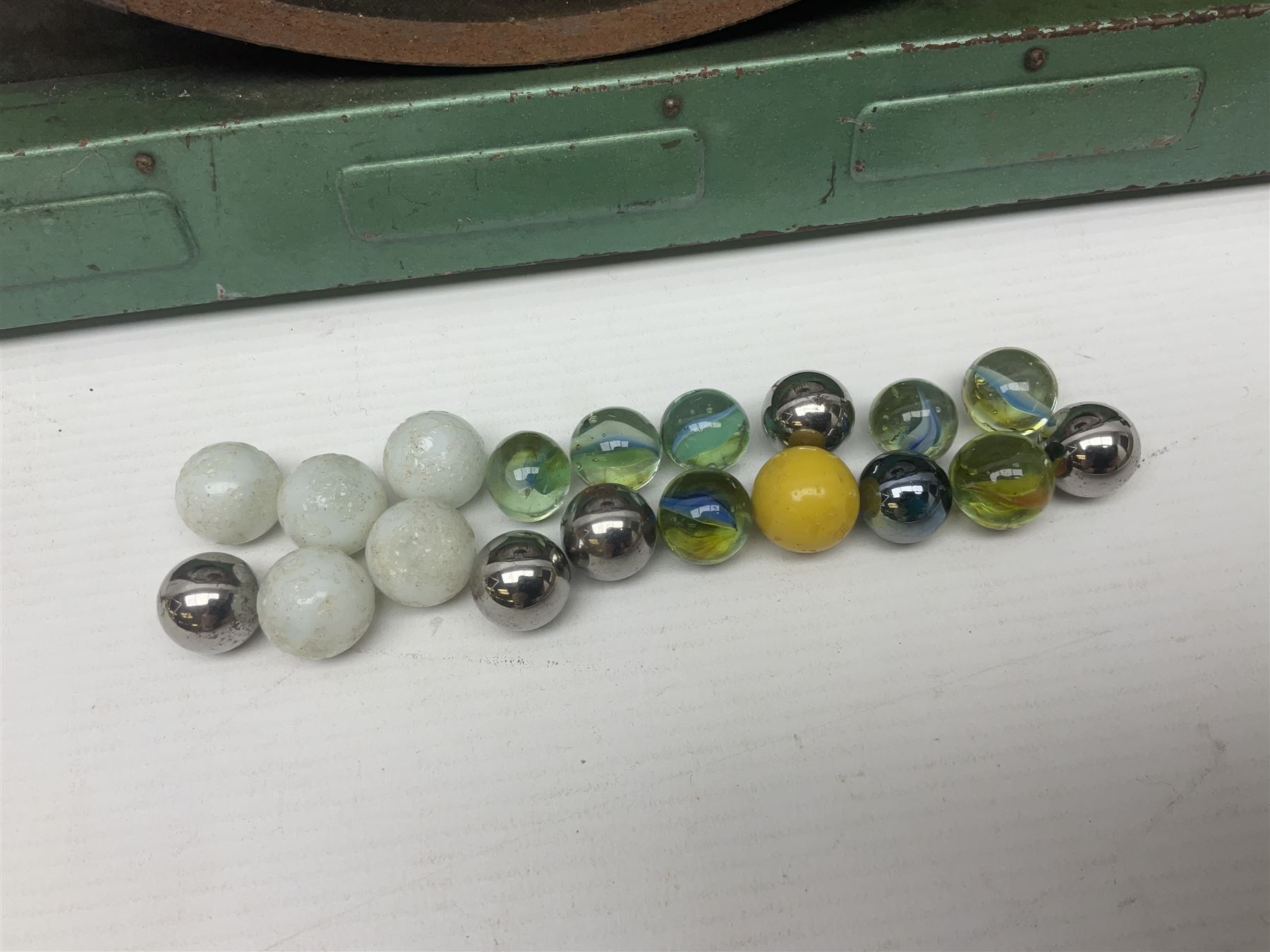 1934 Lindstrom's 'Airways' tin-plate bagatelle game by Lindstrom Tool and Toy Company Bridgeport Conn., the decorative bagatelle board depicting Lindstrom's epic airway routes; with wooden peg and quantity of balls H61cm