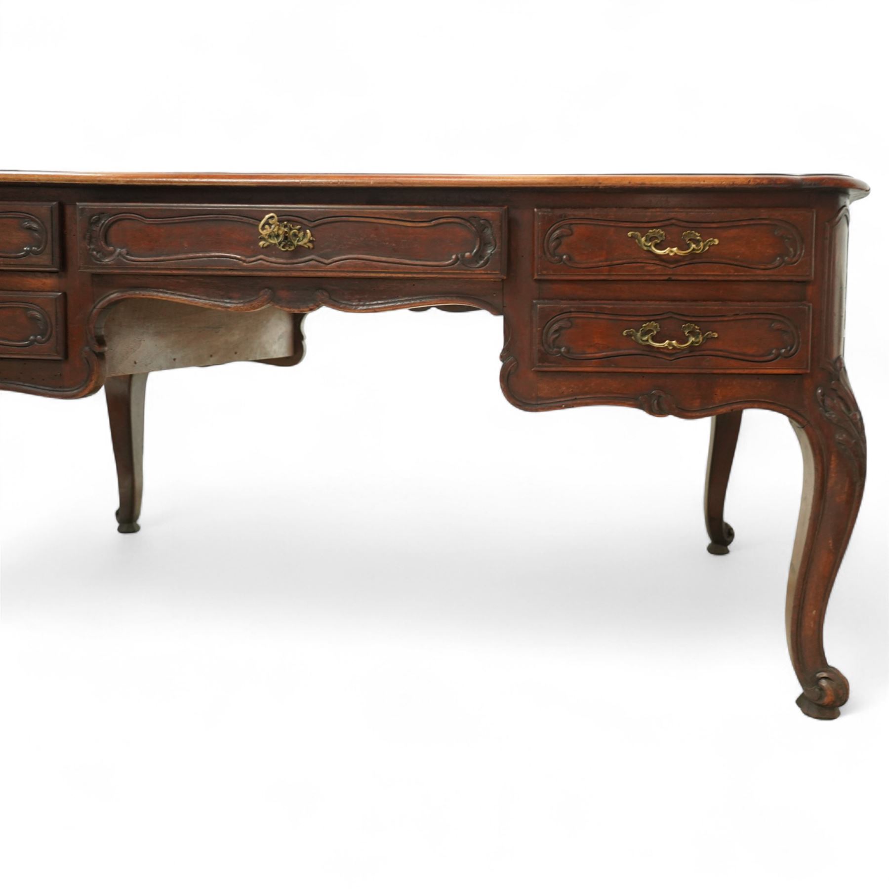 19th-century French mahogany Bureau Plat, inset tooled leather top over three frieze drawers, shaped apron, and cabriole legs carved with acanthus detail 