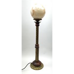 A mahogany and brass floor or desk lamp, with part oblique fluted stem, and marbled effect globular glass shade, including shade, H86cm.