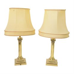 Pair of Corinthian column brass table lamps, with oval shades, H65cm