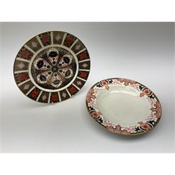 A Royal Crown Derby Imari 1128 pattern plate, D26.5cm, together with a similar smaller example, D21.5cm, and a further example with frilled rim, D21.5cm, each with printed mark beneath, plus four Royal Crown derby Imari pattern 2151 pattern bowls, D27cm. 