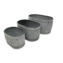 Set three graduating oval planter tubs, with galvanised design 