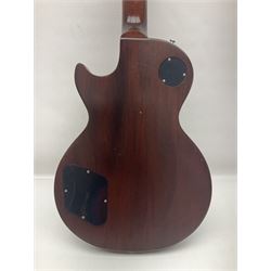 2012 American Gibson Les Paul Studio electric guitar, retro fitted with iron gear pick-ups, push-pull 'pots', roller bridge, string butler and locking machines, serial no.115321594, L99cm overall; in Gibson soft carrying case.