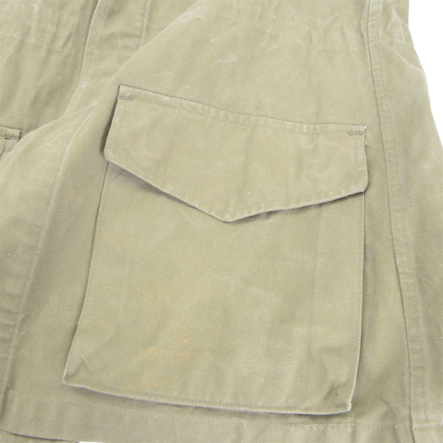 Algerian War French M47 combat tunic and trousers, the tunic marked G. Lellouche Alger 46 inside the collar, the trousers marked 25 U.T.A.H 