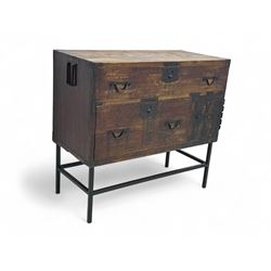 Late 19th century Japanese tansu chest, crafted with a cedar frame and cypress wood panels, original iron fittings throughout, comprising a single long drawer above smaller drawer and hinged cupboard door enclosing two smaller internal drawers and storage compartment, mounted on a bespoke black metal stand