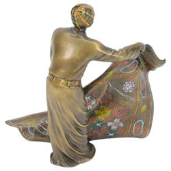 After Franz Bergmann bronzed sculpture of a carpet seller, with colourful painted highlights throughout, H19cm
