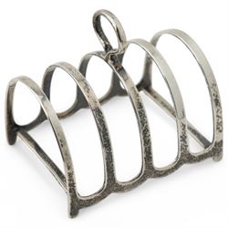 George III silver wine funnel London 1818 Maker William Bateman I, small silver four division toast rack, shell butter dish and two condiments 