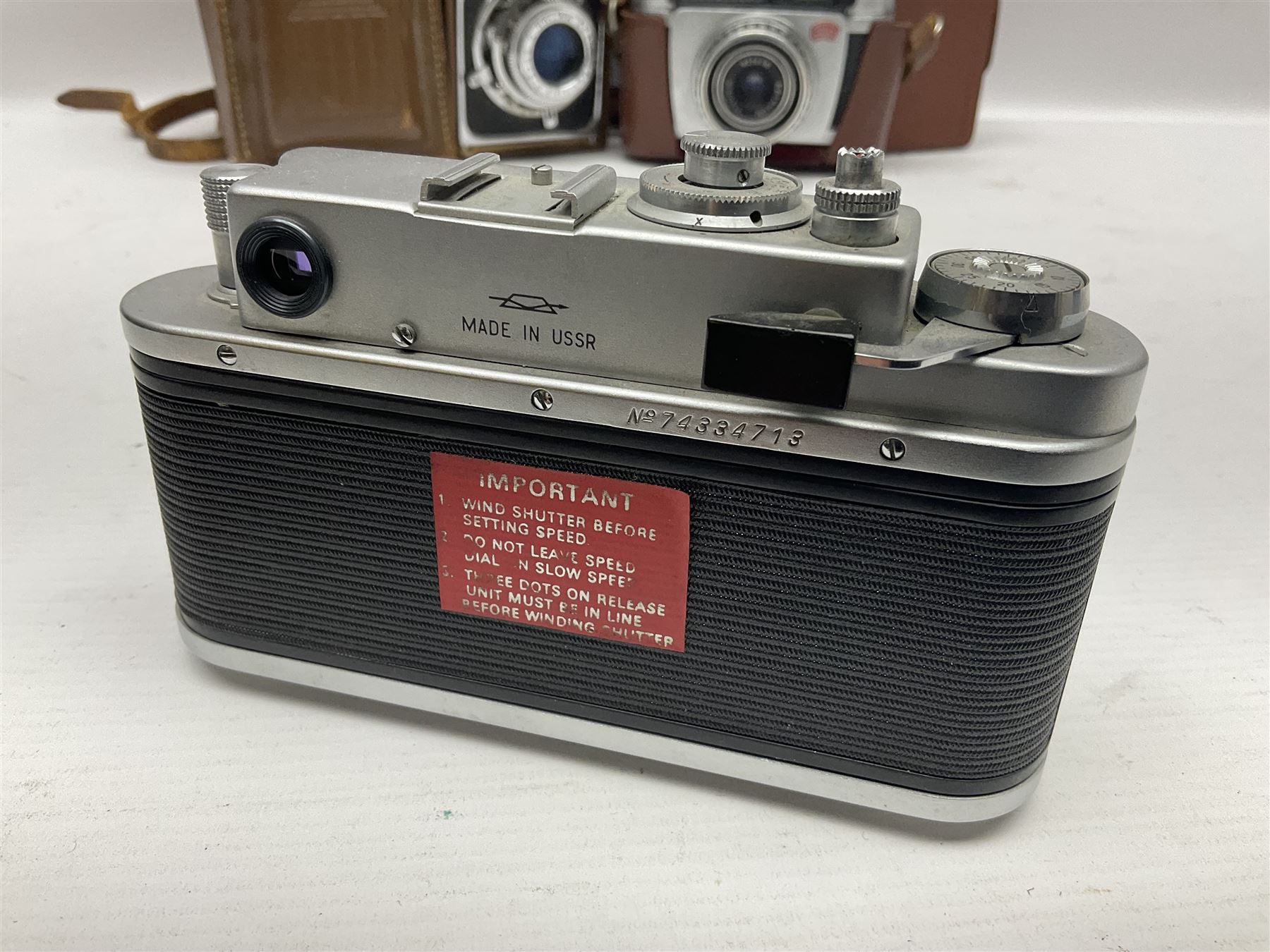 Zorki-4K camera body, serial no 74334713 with 'Jupiter-8 2/50' lens serial no 7454365, Zorki-4 camera body serial no 71012418 with 'Jupiter-8 2/50' lens serial no 0174594, and three other cameras 