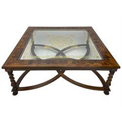Jonathan Charles - large mahogany coffee table, the square oyster veneered top with verre églomisé inset, the glass hand-painted with gilt scrolling foliate patterns, raised on spiral turned supports with acanthus and gadroon carvings, united by interlocking demi-lune stretchers, on scrolled acanthus feet