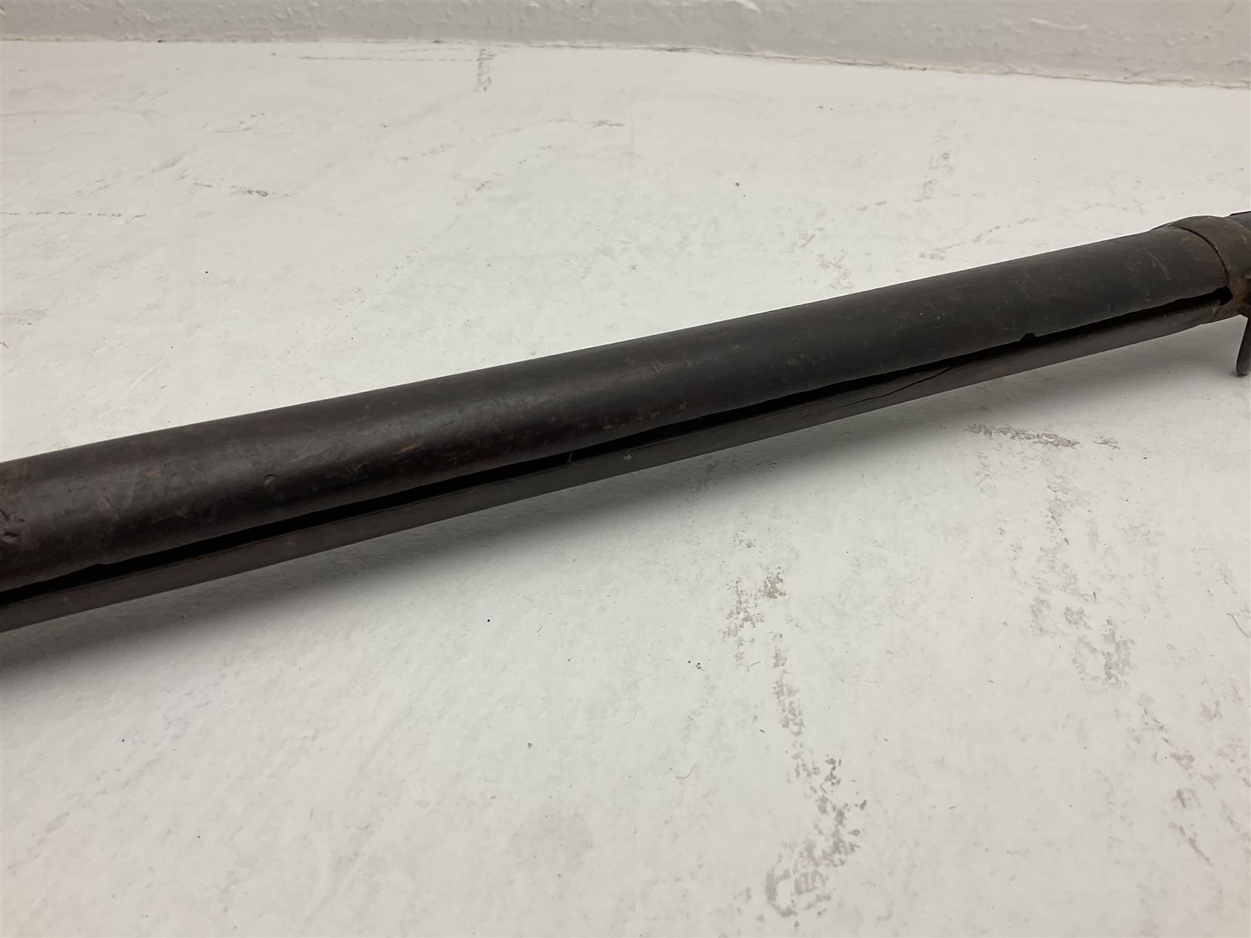 20th century Indian percussion musket, the 76cm barrel with two bands, indistinctly inscribed lock-plate, walnut full stock stamped 642 with brass butt and trigger guard and under barrel ramrod channel L121cm overall