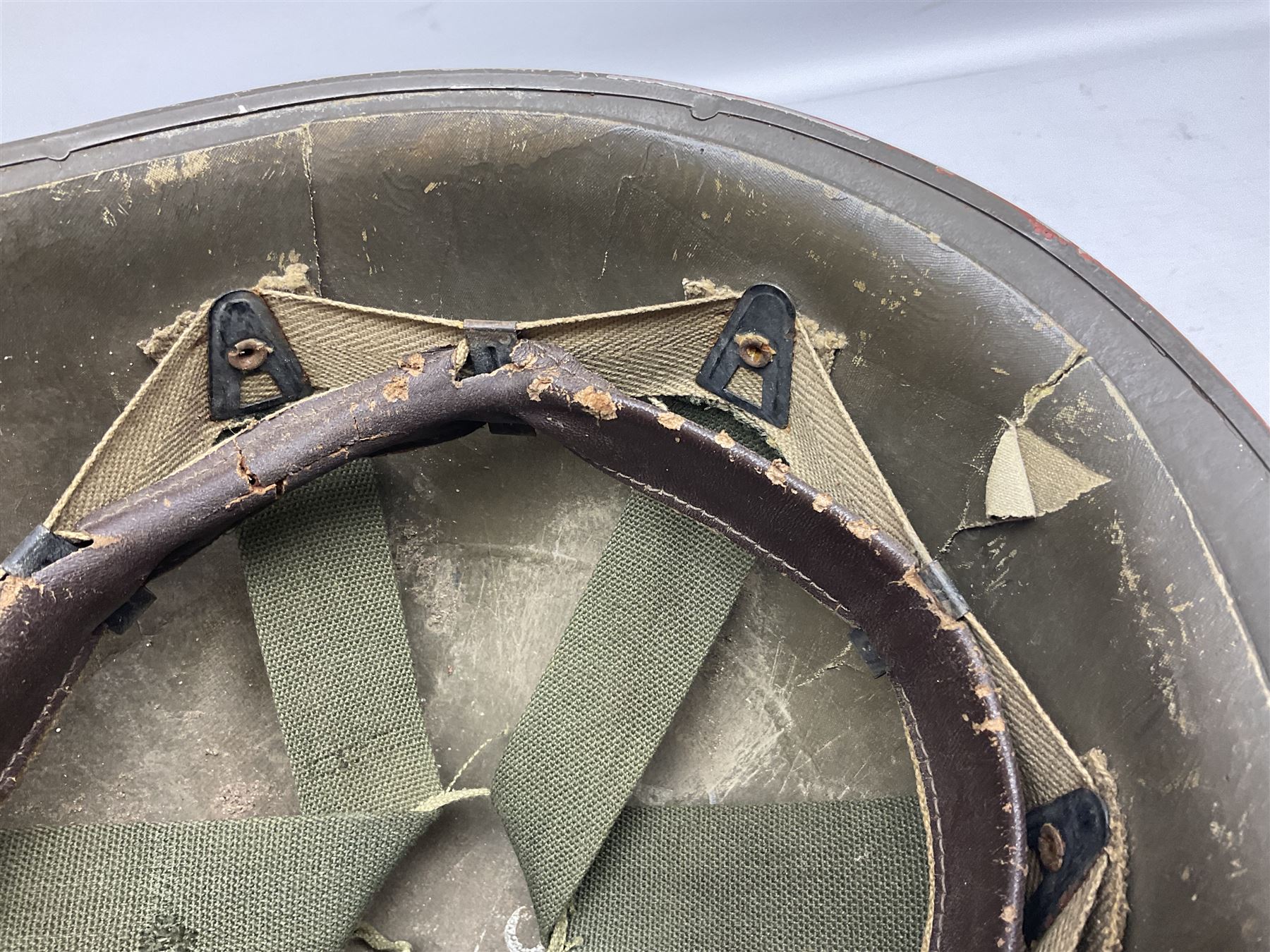 French Algerian War Red Cross steel helmet, marked 'CP ICA Esperaza 1955'; green finish with crudely painted Red Cross logo to the front