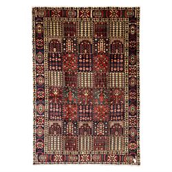 Bakhtiari wool rug, compartmented garden design field with panels of stylised trees, flowe...