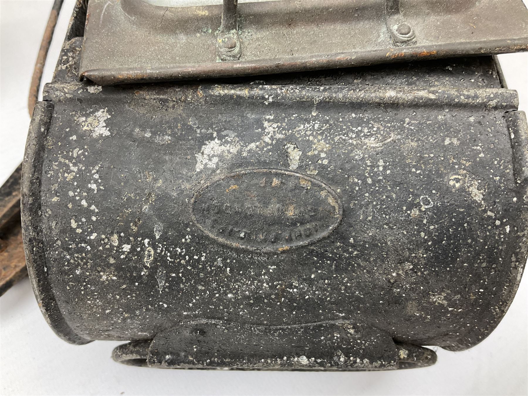 Collection of cast iron lamps, predominantly railway and coach examples, to include John Phillips Light of London Lamp Co coach lamp and Lito bicycle lamp by Miller & Co of Birmingham, etc