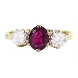 18ct gold three stone oval cut ruby and round brilliant cut diamond ring, London 1979, ruby approx 0.50 carat, total diamond weight approx 0.45 carat