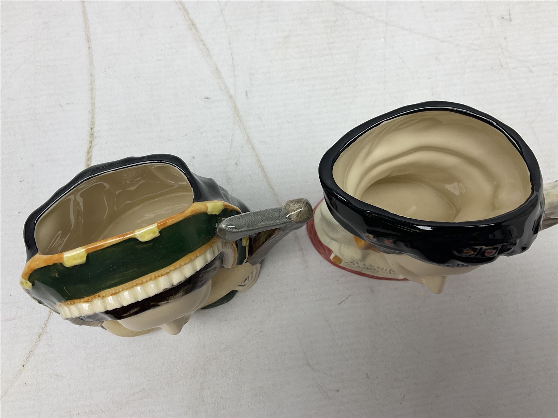 Royal Doulton Henry VIII and his Six Wives Character Jugs, comprising of Henry VIII D6647, Catherine of Aragon D6657, Anne Boleyn D6650, Jane Seymour D6746, Anne of Cleves D6753, Catherine Howard D6692 and Catherine Parr D6751, tallest H10cm