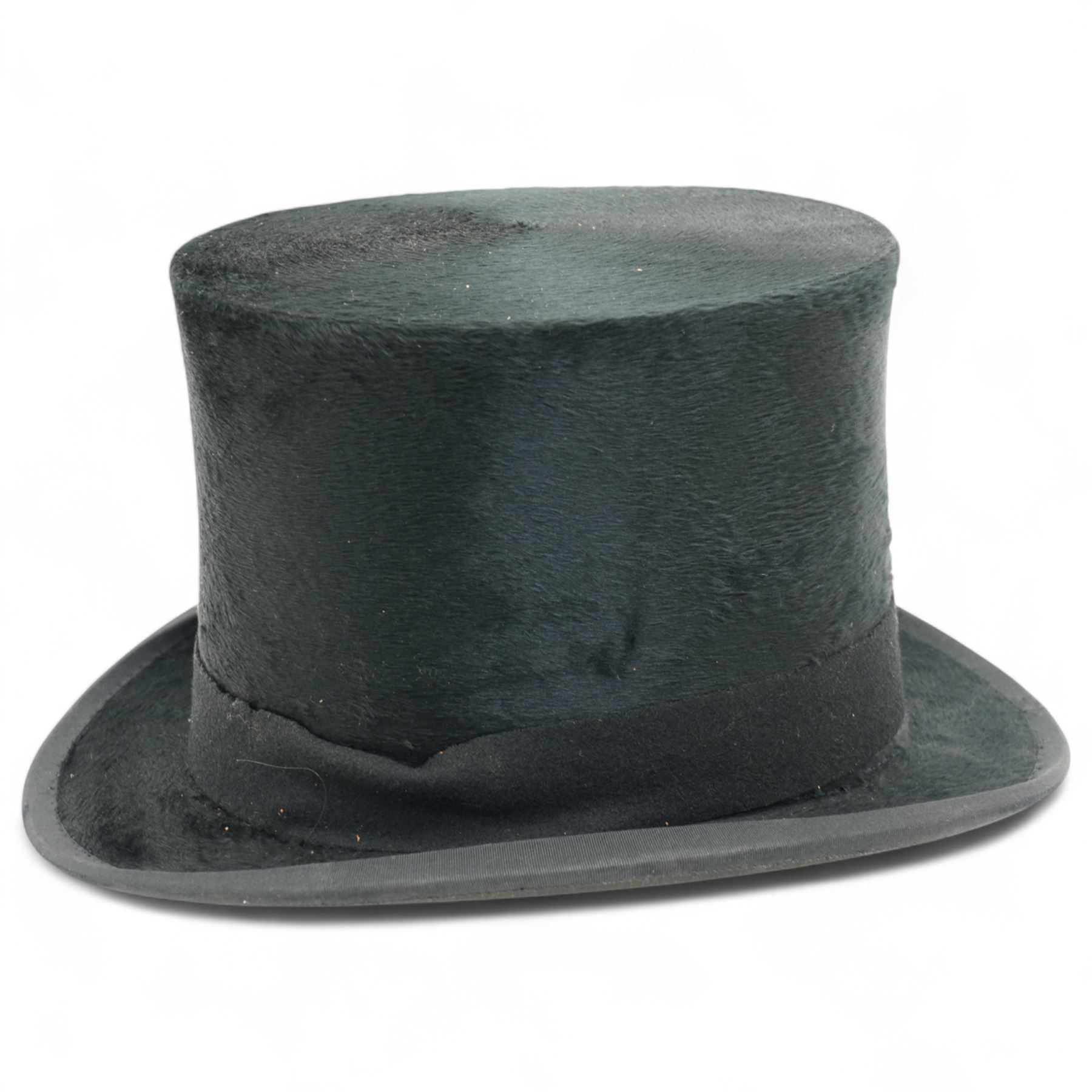 Black top hat by TB & W Cockayne in leather hat box 