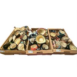 Collection of character and toby jugs and teapots, mostly Royal Doulton examples, in three boxes 