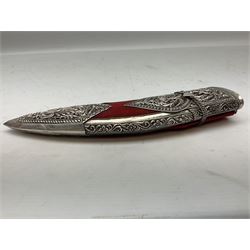Eastern Presentation Kukri, 25cm blade, in ornate white metal sheath with bird and foliate open-work decoration, red velvet detail, two miniature knives, 40cm overall