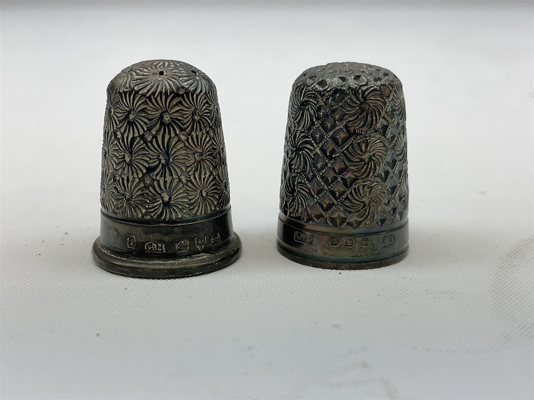 1930's silver lobster pick, hallmarked Birmingham 1936, two Victorian silver thimbles, glass dressing table jar with silver cover, part babies rattle with bone teething ring, approximate weighable silver (not including glass or rattle) 45.3 grams