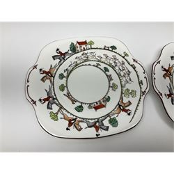 Coalport and Crown Staffordshire hunting scene part teawares, to include eleven teacups and saucers of various sizes, two cake plates, two jugs, four sugar bowls, fourteen dessert plates, etc (68)