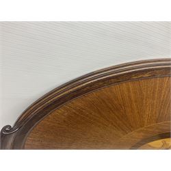Late 19th/early 20th century mahogany and marquetry inlaid tray, of oval form with twin scrolled handles and moulded border, the central panel inlaid with figures seated at a table drinking tea, L99cm