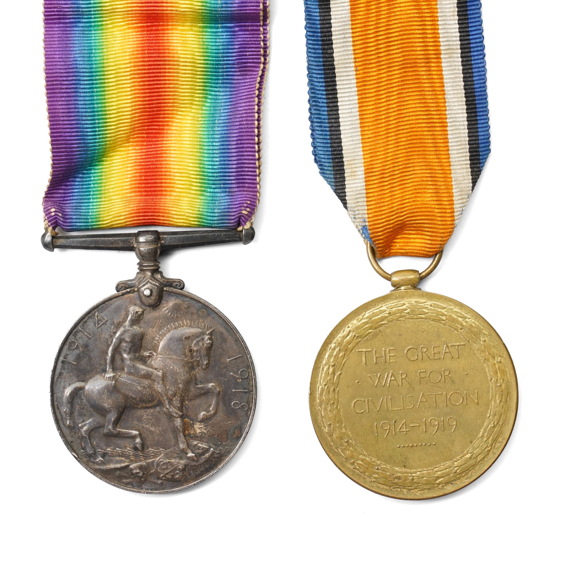 WWI British medal group, comprising War medal and Victory medal, awarded to 19187 Pte C.F.Markham. Linc. R together with war badge, another WWI war medal awarded to M2-099590 Pte W. Jolly A.S.C, and two Empire day medals  