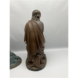 Two religious painted plaster figures of Mary and Joseph kneeling on oval plinths, with impressed mark 'Raffl et Cie Paris', H60cm 