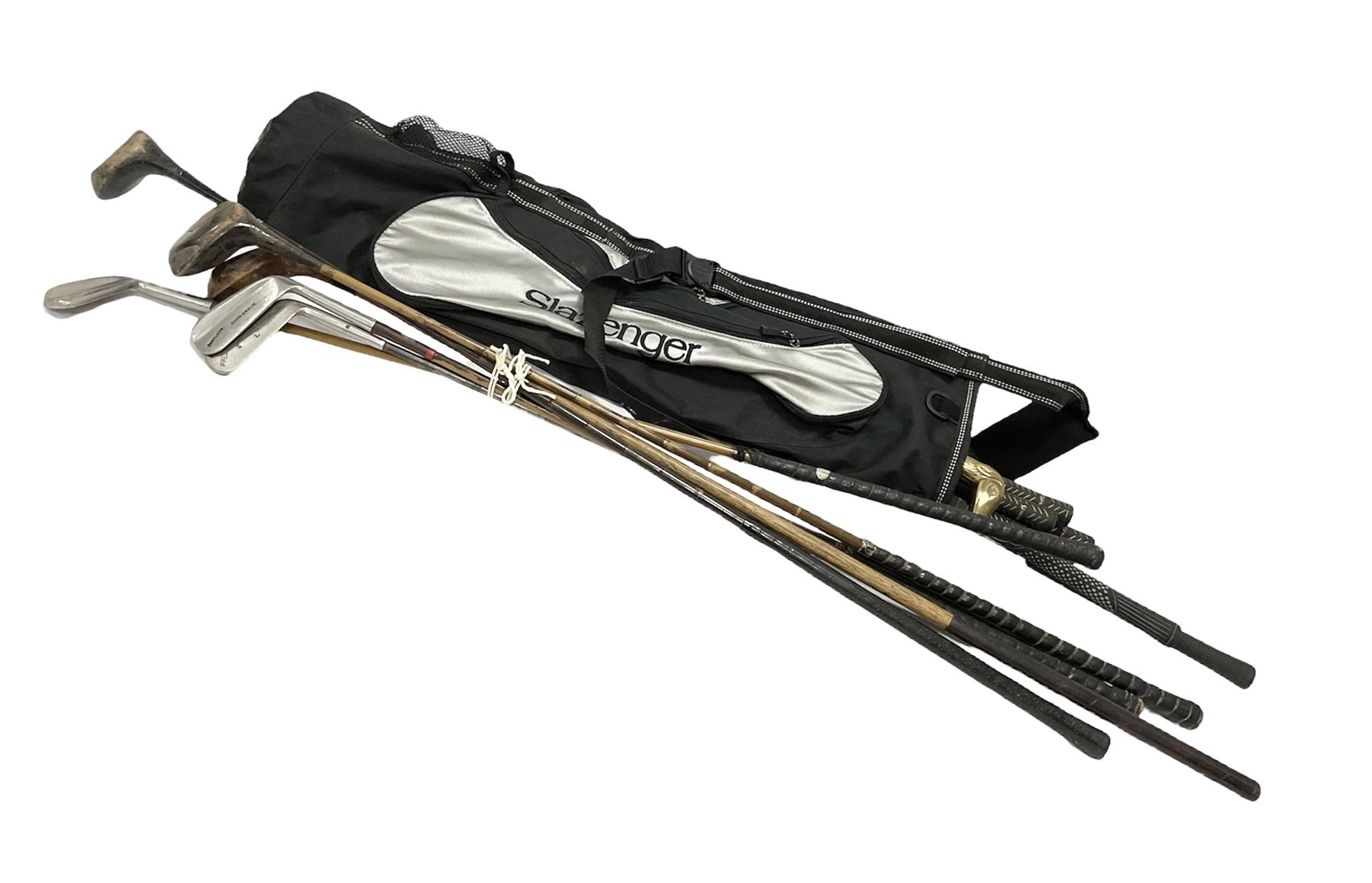 Quantity of golf clubs to include Prestwick Mashie, Ben Sayers and Spalding examples etc in Slazenger soft shell carrying bag
