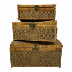 Set of three dome top cane storage baskets