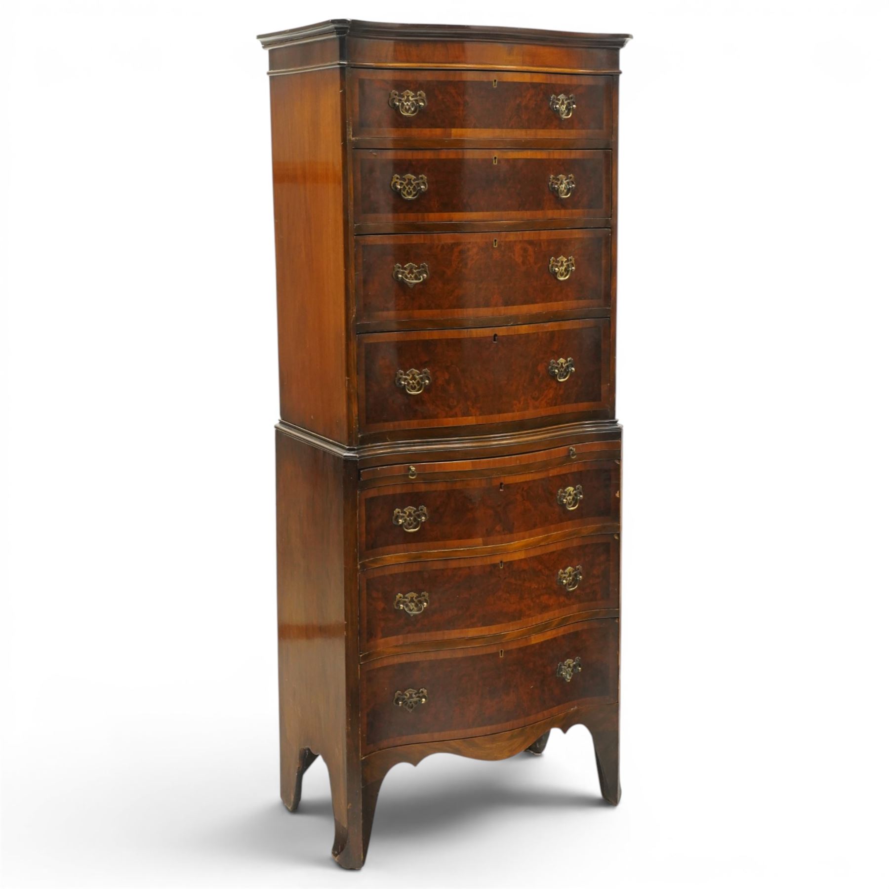 Queen Anne style burr walnut serpentine chest on chest, the upper chest with four graduating drawers with burr fronts and cross banded edges and pierced brass handles, the bottom chest with brushing slide above three graduated drawers, shaped lower apron on splayed feet 
