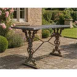 Edwardian ornate cast iron garden table, later rectangular granite top