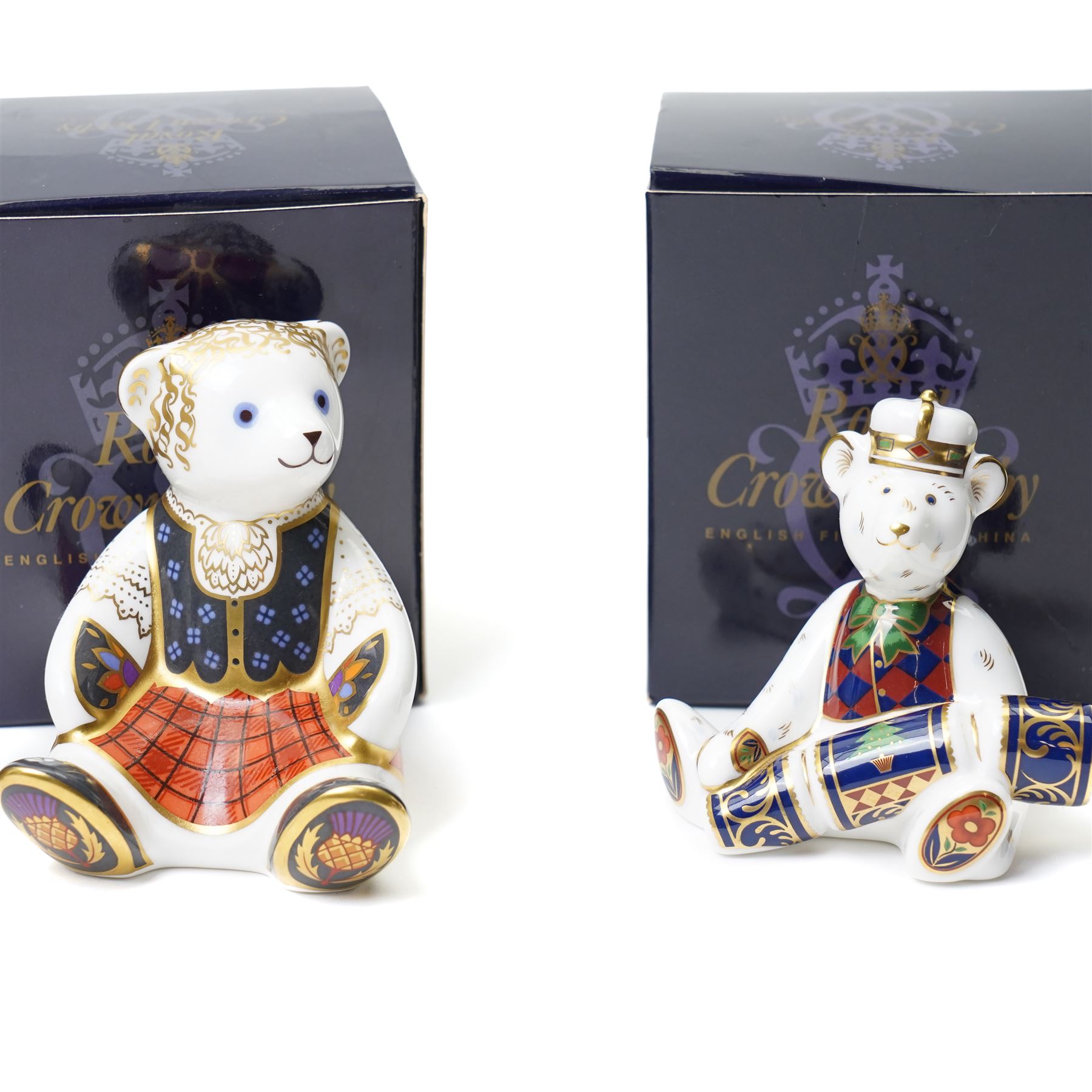 Set of eight Royal Crown Derby teddies, comprising cook, shopping, Daddy and George, Mummy and Charlotte, gardener, school boy, Xmas and Scottish teddy, no stoppers, all boxed (8)