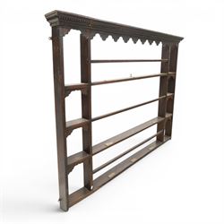 Georgian oak plate rack, moulded and dentil cornice over shaped frieze, fitted with open shelves and narrow side compartments with shaped aprons