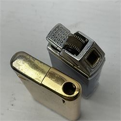 Collection of lighters, including Ronson Varaflame, Zorr Classic, Dunhill bark effect roller gas lighter, and faceted blue glass table lighter, etc