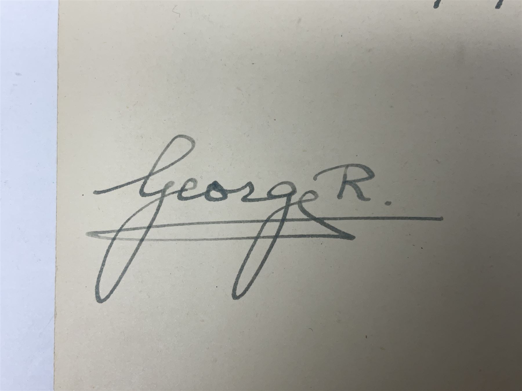 King George VI and Queen Elizabeth - signed 1949 Christmas card with gilt embossed crown to cover, black and white photograph to the interior, of The King and Queen riding in an open carriage to their Silver Wedding Celebration, signed 'George R. Elizabeth R.'