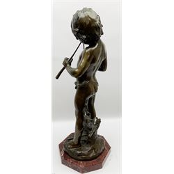 After Auguste Moreau (French 1834-1917): large bronze figure modelled as a young boy playing two pipes, standing upon a naturalistically modelled base detailed with tree stump and further pipe, signed Aug Moreau, upon octagonal red marble base, H72cm 