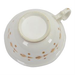 H&R Daniel, pair of trios, coffee cup, teacup and a saucer, circa 1826
pattern 4057, 'Second Gadroon Variation A', painted with fine foliate sprays and gilt hatched reserves, coffee cup including handle H8cm, saucer D14cm