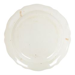 Late 18th century named creamware plate with black printed decoration, of circular form with shaped rim, inscribed to the centre 'Henry Gittings' within a foliate a C scroll surround, the rim detailed with floral sprigs, D24cm