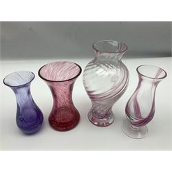 Collection of pink/purple Caithness glass vases, to include mottled and swirl designs, largest 20cm (19)