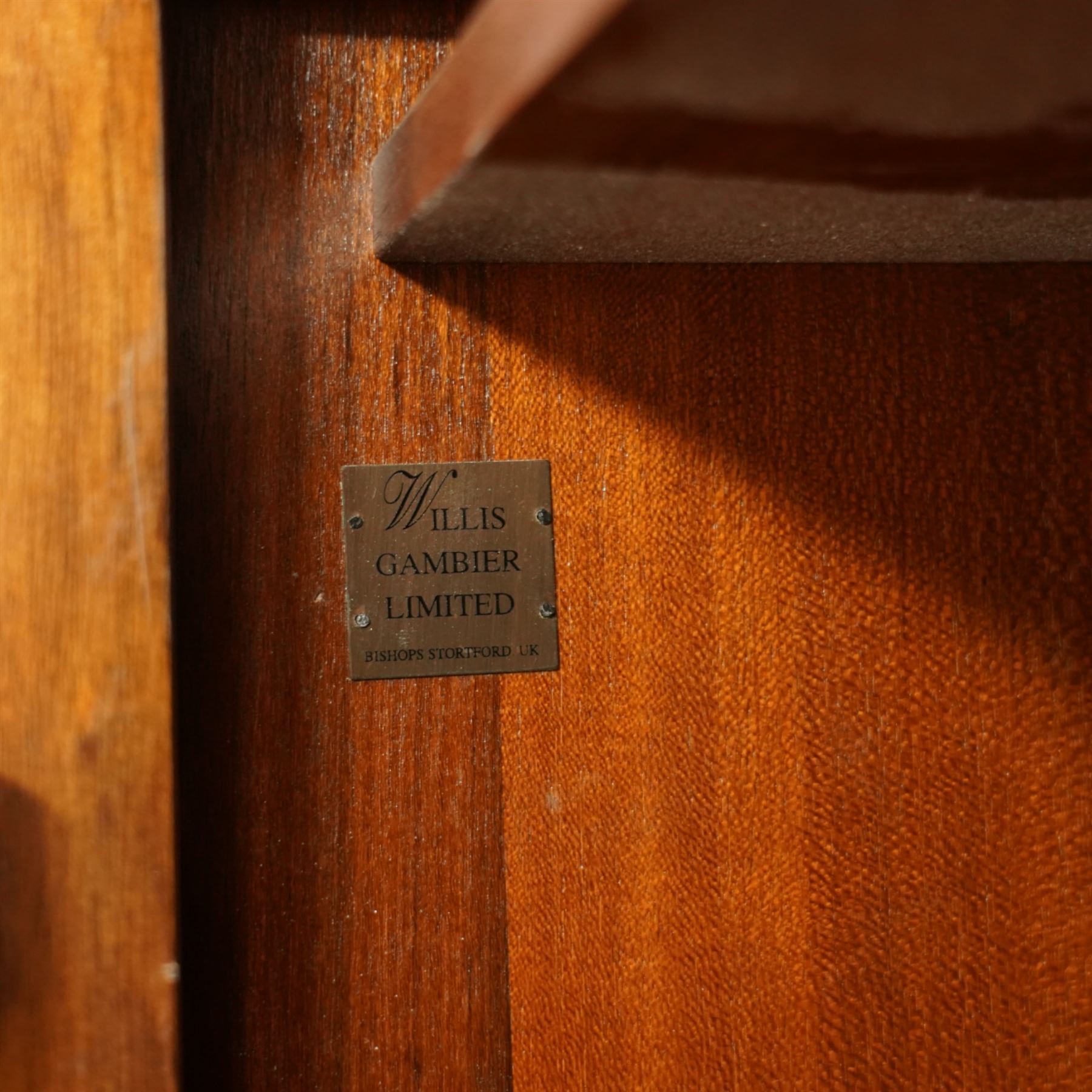 Willis & Gambier - French cherry wood double wardrobe, moulded cornice above two panelled doors opening to a hanging interior with rail and shelf, raised on bracket feet