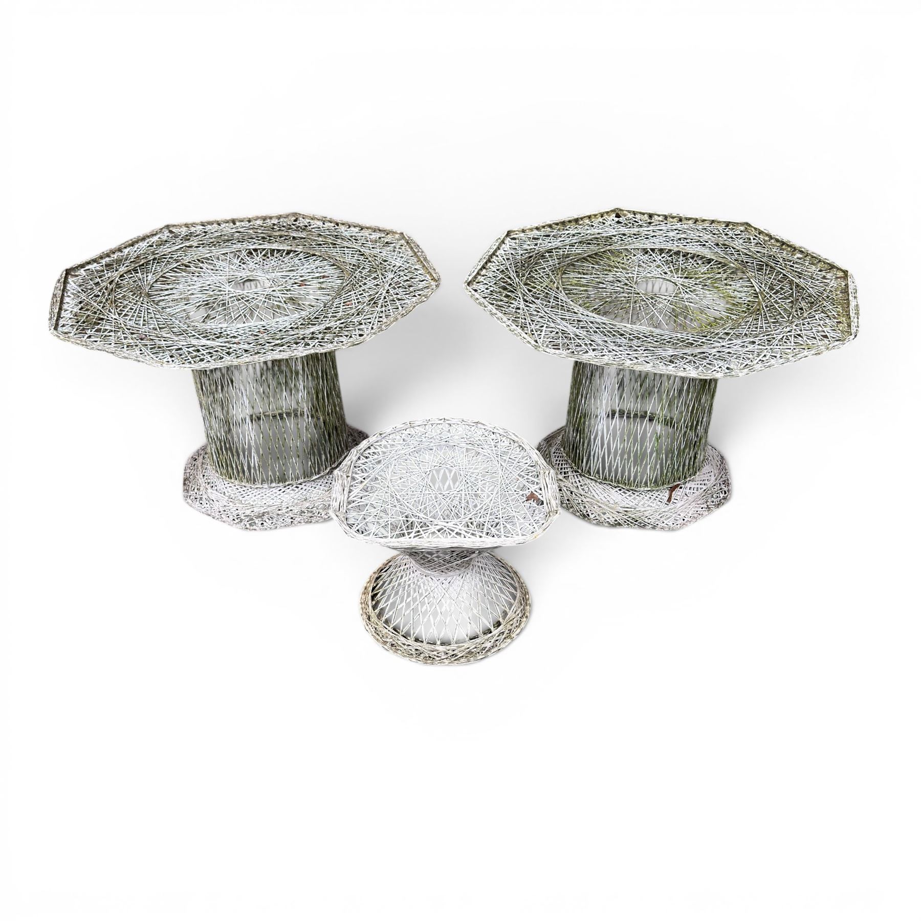 Two French early 20th century painted wicker octagonal garden tables, circular pedestals with parasol opening; with matching side table (3)