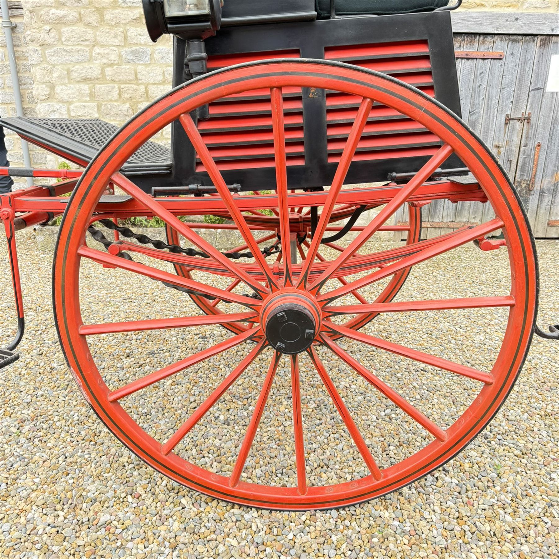 Holland & Holland Tandem Cart - Althorp Spencer Family Estate

A two wheeled tandem cart or cocking cart by Holland & Holland Coach Builders, London, with black painted bodywork, red painted shafts and running gear, red wooden spoked wheels with rubber tyres, green upholstered seating and a rear perforated metal footboard. The cart is fitted with carriage lamp brackets (lamps next lot), green buttoned cushions with leather retaining straps, side louvered body panels, footrests, leaf spring suspension and shafts for horse use. The carriage incorporates an adjustable body position, operated by a lever, allowing the body to be moved forwards or backwards to alter the weight distribution. Formerly owned by the family of Lady Diana Spencer,
Sympathetically conserved by Woods of Fairbourne Carriages Ltd, Kent.

Features:
• Brass maker’s plaque for Holland & Holland Coach Builders, London
• Two wheeled tandem cart
• Black painted body with red painted shafts and running gear
• Red wooden spoked wheels with rubber tyres
• Green upholstered cushions with leather retaining straps
• Adjustable carriage body for weight distribution
• Lever operated adjustment mechanism
• Perforated rear footboard
• Side footrests
• Louvered side panels
• Leaf spring suspension
• Rear opening storage compartment
• Decorative painted armorial motif to rear panel
• Fitted carriage lamps shown, not included in the lot (available as next lot)
• Conserved by Fairbourne Carriages Ltd
• Provenance: The Althorp Attic Sale including The Spencer Carriages, lot 195, 7 July 2010

Dimensions:
Overall length 396 / 198cm
Width 155cm
Height 190cm

Wheel Diameters:
Wheels: 148cm

Seating:
Driving seats: 2
Passenger seats: 2