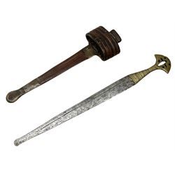 Northern Nigerian 'Nupe' arm dagger, the 40cm steel blade with unusual rounded tip, cast and pierced brass hilt and matching brass mounted leather scabbard 56cm overall